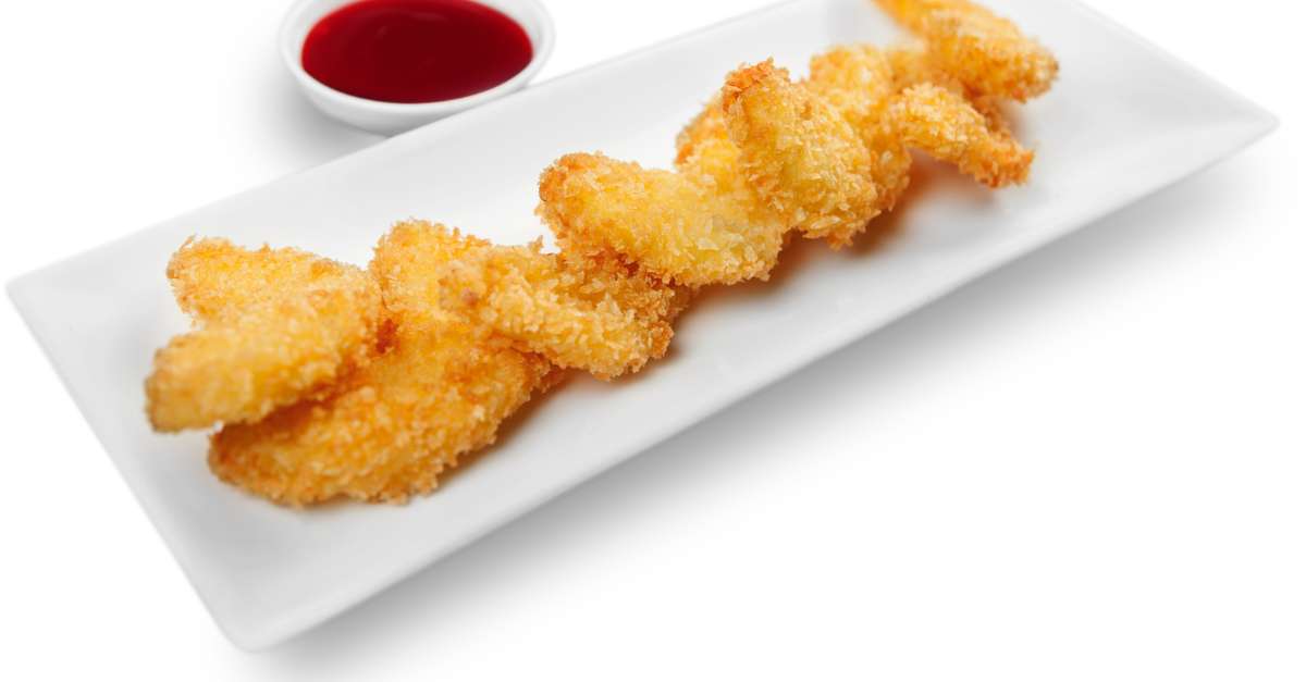 Receita fácil e deliciosa de nuggets de frango caseiros na Air Fryer.